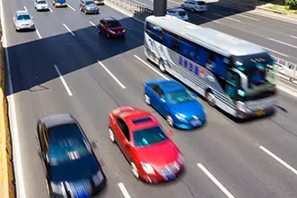 bus and cars on the highway