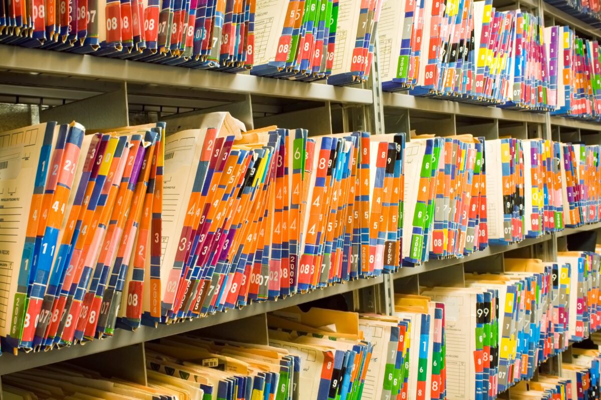 A wall of medical files
