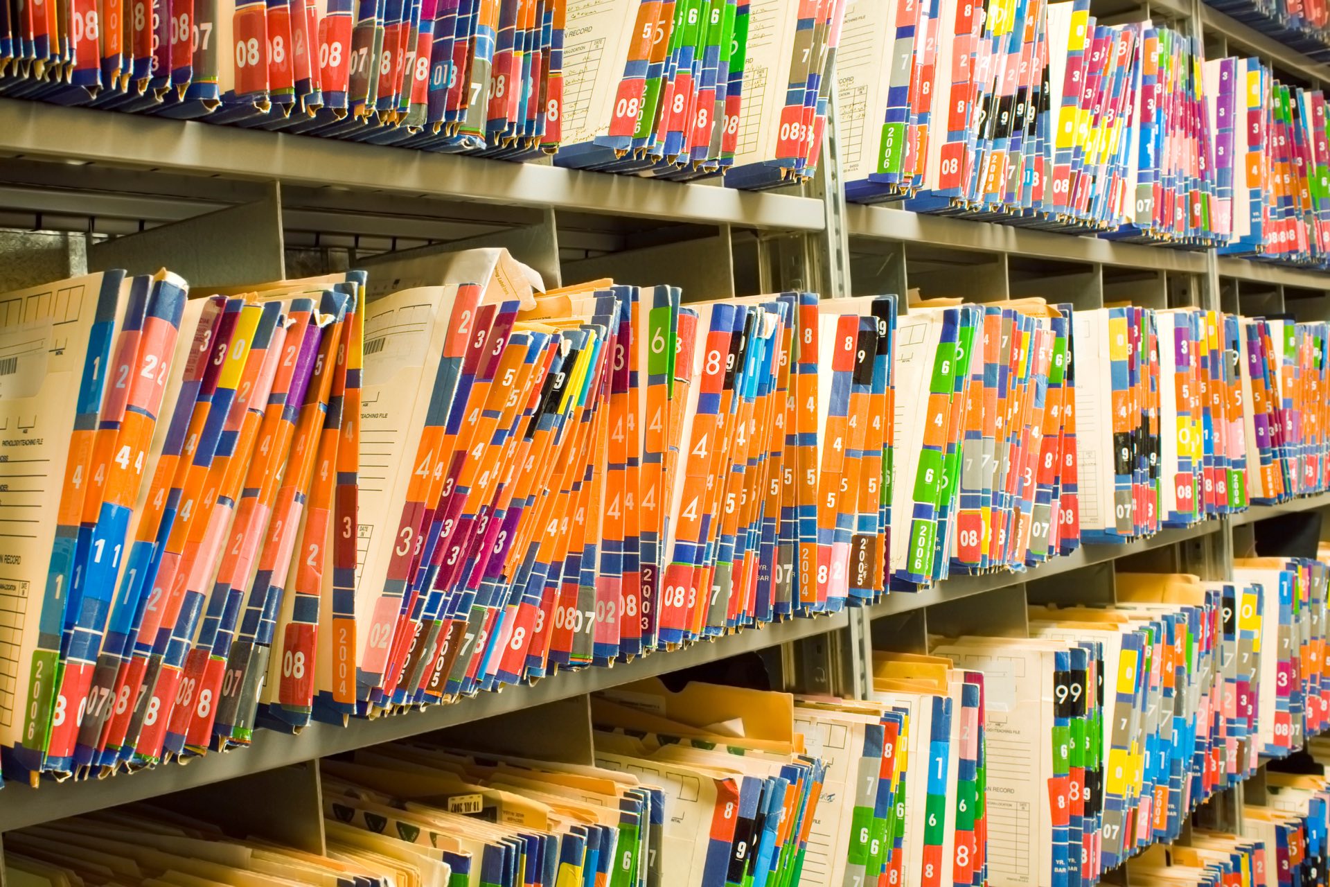 A wall of medical files
