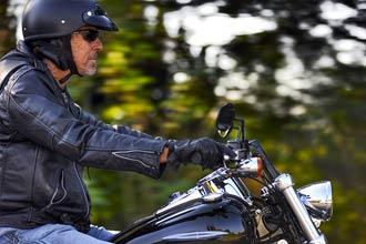 Motorcyclist in jacket and helmet | motorcycle accident lawyer | The Law Offices of Edward Smith LLC