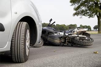 Motorcycle lying on the road | motorcycle accident lawyer | The Law Offices of Edward Smith LLC