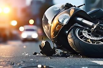 Crashed motorcycle on its side | motorcycle accident lawyer | The Law Offices of Edward Smith LLC