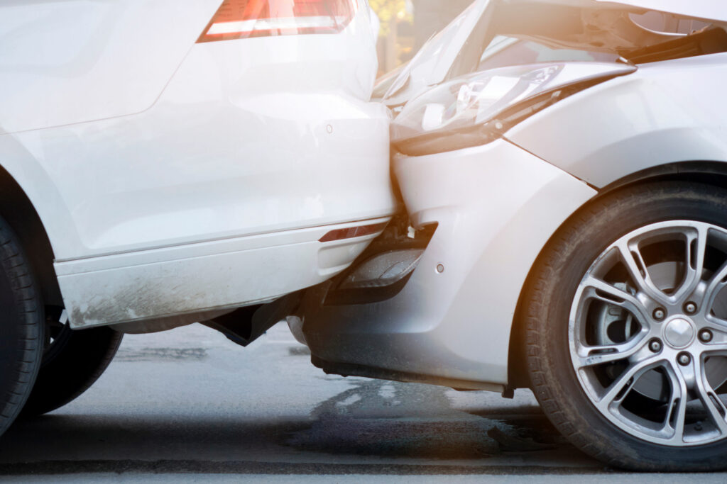 Hand reaching out a car window | car accident attorney | The Law Offices of Edward Smith LLC