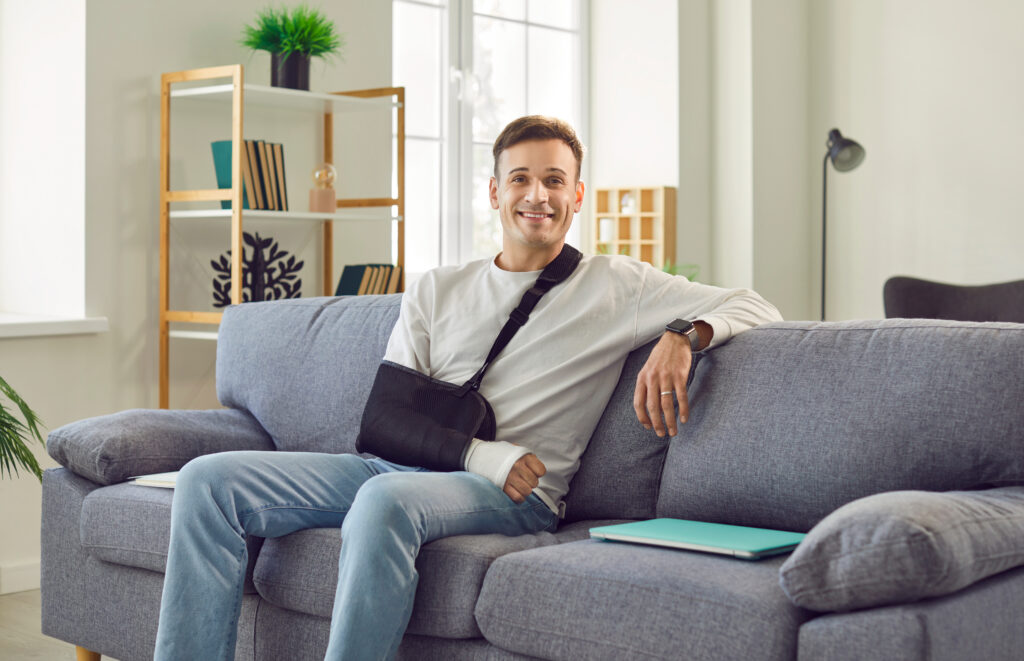 Man at home with an arm in a sling | slip and fall lawyer | The Law Offices of Edward Smith LLC