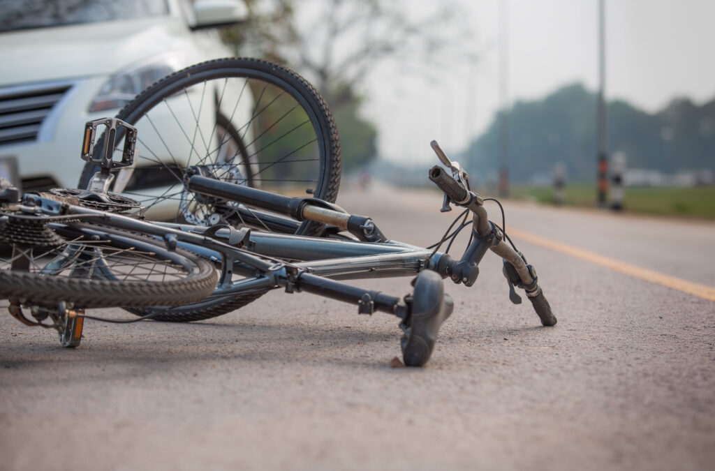 Bicycle on its side on the road | bicycle accident lawyer | The Law Offices of Edward Smith LLC