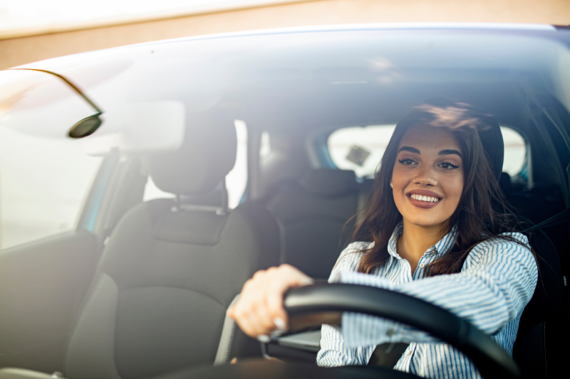 Woman behind the wheel of a car | car accident attorney | The Law Offices of Edward Smith LLC